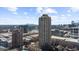 Expansive aerial perspective capturing the city skyline, modern architecture, and lush green landscapes at 3475 Oak Valley Ne Rd # 410, Atlanta, GA 30326