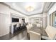 Community room featuring a dining table, lounge area, bar and TV at 3475 Oak Valley Ne Rd # 410, Atlanta, GA 30326