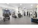 Community gym with treadmill, weights, and stair climber at 3475 Oak Valley Ne Rd # 410, Atlanta, GA 30326