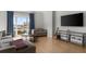Cozy living room with a view from the window at 3475 Oak Valley Ne Rd # 410, Atlanta, GA 30326