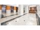 Welcoming lobby with tile floors, front desk, and elevator access at 3475 Oak Valley Ne Rd # 410, Atlanta, GA 30326