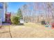 Expansive backyard featuring an above-ground pool, play set, and ample space for outdoor activities and Gathering fun at 4046 Harvest Ridge Dr, Douglasville, GA 30135