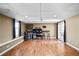 Finished basement featuring a bar, entertainment area, and hardwood floors, perfect for entertaining guests at 4046 Harvest Ridge Dr, Douglasville, GA 30135