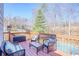 Deck with four chairs and a table with a view of the backyard at 4046 Harvest Ridge Dr, Douglasville, GA 30135