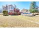 Rear view of the home, highlighting its deck, above-ground pool, and well-maintained backyard at 4046 Harvest Ridge Dr, Douglasville, GA 30135