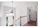 Bright foyer with hardwood floors, a chandelier, and natural light creating an inviting entry at 4046 Harvest Ridge Dr, Douglasville, GA 30135
