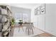 Well-lit office space featuring a desk, chair, shelving, and decor at 505 Windy Ridge Ct, Canton, GA 30114