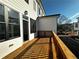 Wooden deck showcasing the exterior of the home with views of the surrounding landscape at 532 Healy Dr # 70, Cumming, GA 30040