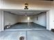 View of a large, clean garage space with white-painted walls and concrete flooring at 508 Healy Dr # 70, Cumming, GA 30040