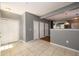 Hallway with tile floor and multiple doors leading to various rooms at 215 Odyssey Turn, Conyers, GA 30012