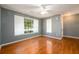 Cozy living room with natural light and hardwood floors at 215 Odyssey Turn, Conyers, GA 30012