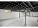 Spacious unfinished basement with painted walls and exposed ceiling beams at 3363 Briarcliff Ne Rd, Atlanta, GA 30345