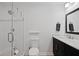 Bathroom featuring modern vanity with marble countertop, toilet, and glass shower at 3363 Briarcliff Ne Rd, Atlanta, GA 30345