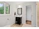 Well-lit bathroom featuring a modern vanity, tile floors, and a window at 3363 Briarcliff Ne Rd, Atlanta, GA 30345