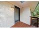 Clean design of the exterior brick and lighting next to the front door at 3363 Briarcliff Ne Rd, Atlanta, GA 30345