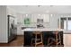 Beautiful kitchen featuring white cabinets, stainless steel appliances, and island with barstool seating at 3363 Briarcliff Ne Rd, Atlanta, GA 30345