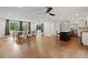 Spacious, open floor plan connecting the kitchen and dining area with natural light and hardwood floors at 3363 Briarcliff Ne Rd, Atlanta, GA 30345