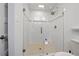 Modern glass shower with white subway tile and mosaic accent at 3363 Briarcliff Ne Rd, Atlanta, GA 30345