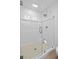 Glass shower with white subway tile and modern fixtures at 3363 Briarcliff Ne Rd, Atlanta, GA 30345
