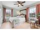 Comfortable bedroom with natural light, hardwood floors, and stylish furnishings at 560 Goldsboro Ne Rd # C, Atlanta, GA 30307