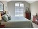Well-lit bedroom featuring neutral walls, carpet and large windows with blinds at 120 Chastain Nw Rd # 1803, Kennesaw, GA 30144