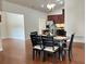 Dining room showcases hardwood floors and stylish lighting fixtures at 120 Chastain Nw Rd # 1803, Kennesaw, GA 30144