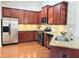 Modern kitchen with stainless steel appliances, granite countertops and hardwood flooring at 120 Chastain Nw Rd # 1803, Kennesaw, GA 30144
