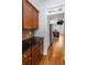 Kitchen view featuring granite countertops, stainless steel appliances, and a pass through to the living room at 1337 Benteen Park Se Dr, Atlanta, GA 30315