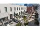 Overhead view of townhome community featuring private patios and well-manicured landscaping at 210 Calypso Cir, Atlanta, GA 30305