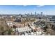 Aerial view of the townhome community with the city skyline in the background at 210 Calypso Cir, Atlanta, GA 30305