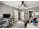This Home Office has a contemporary desk setup and a cozy seating area at 210 Calypso Cir, Atlanta, GA 30305