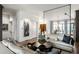 Spacious living room with stylish furniture and a decorative screen, creating an inviting atmosphere at 210 Calypso Cir, Atlanta, GA 30305