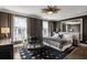 Spacious main bedroom with dark walls, area rug, and large windows at 210 Calypso Cir, Atlanta, GA 30305