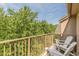 Balcony view with lush greenery and seating at 2865 Lenox Road Ne # 602, Atlanta, GA 30324
