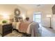 Bedroom featuring a window, queen bed, a desk, and an area rug at 2865 Lenox Road Ne # 602, Atlanta, GA 30324