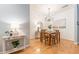 Cozy dining area with a modern chandelier, hardwood floors, and stylish decor at 2865 Lenox Road Ne # 602, Atlanta, GA 30324