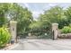 Elegant gated entrance with stone pillars, providing security and curb appeal at 2865 Lenox Road Ne # 602, Atlanta, GA 30324