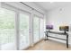 Bright home office space with tile floors, lots of natural light from the French Doors, and neutral decor at 2865 Lenox Road Ne # 602, Atlanta, GA 30324