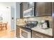 Well-appointed kitchen with granite countertops, stainless steel appliances, and modern backsplash at 2865 Lenox Road Ne # 602, Atlanta, GA 30324