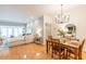 Open-concept living and dining area with hardwood floors and ample natural light at 2865 Lenox Road Ne # 602, Atlanta, GA 30324