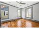 Bright bedroom with beautiful hardwood floors and lots of natural light at 34 N Broad N St, Porterdale, GA 30014