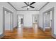 Bright living room showcasing hardwood floors, neutral walls, and classic architectural details at 34 N Broad N St, Porterdale, GA 30014