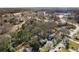 An aerial view showcases the neighborhood with mature trees, well-maintained homes, and close proximity to amenities at 4223 Mountain Glen Trce, Snellville, GA 30039