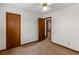 Bedroom featuring carpet flooring, ceiling fan and a window at 4223 Mountain Glen Trce, Snellville, GA 30039