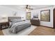Serene bedroom with neutral colors, hardwood floors, and natural light at 4223 Mountain Glen Trce, Snellville, GA 30039