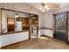 Dining area and kitchen featuring traditional decor, natural light, and hardwood floors at 4223 Mountain Glen Trce, Snellville, GA 30039
