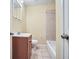 Small bathroom with a combination shower and tub with standard toilet and sink at 1276 Clay Sw Rd, Mableton, GA 30126