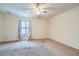 Empty bedroom with carpet and standard ceiling fan at 1276 Clay Sw Rd, Mableton, GA 30126