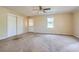 Bedroom featuring neutral walls and carpet with access to back yard at 1276 Clay Sw Rd, Mableton, GA 30126