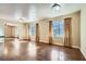 Spacious living room featuring hardwood floors and natural light at 1276 Clay Sw Rd, Mableton, GA 30126